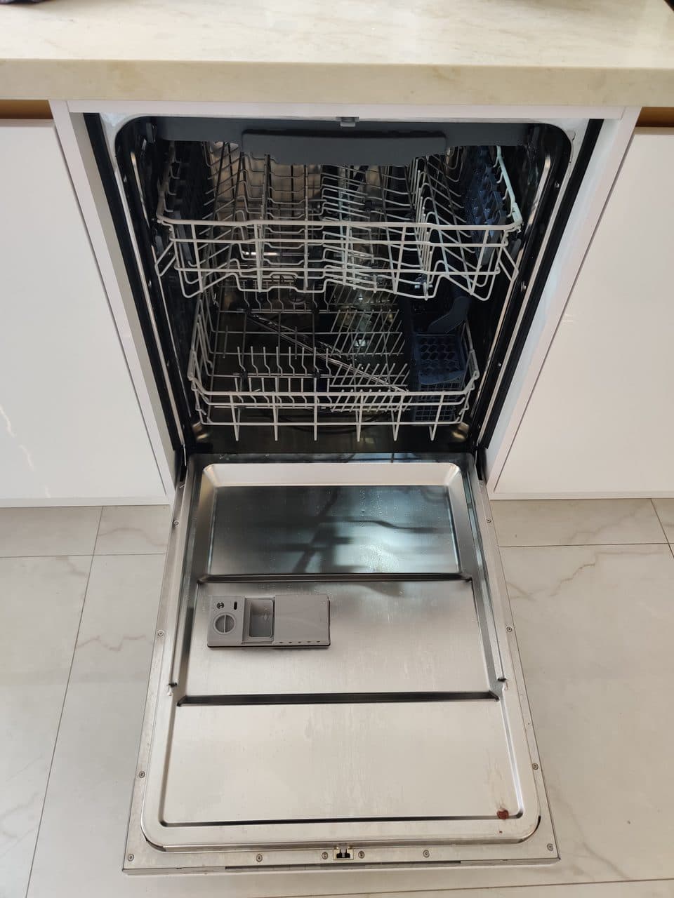 Dishwasher opened for service: KoolMore dishwasher, model KM-DW2445-PR (dishwasher repair in Hialeah, FL, October 2026)