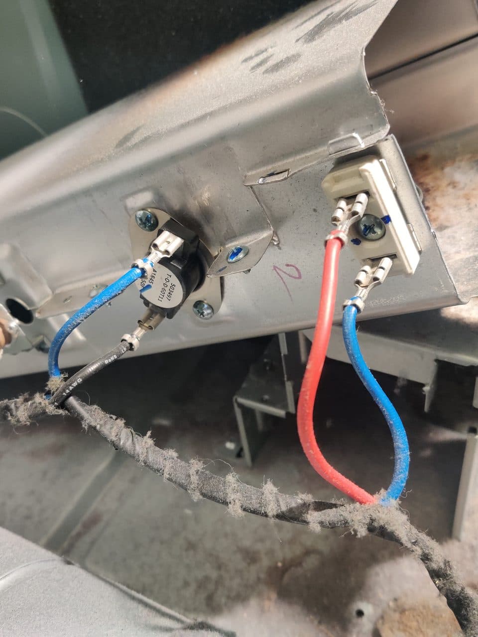 Dryer heater housing with thermostats: Samsung dryer, model DVE45N5300V (dryer repair in Hialeah, FL, September 2026)