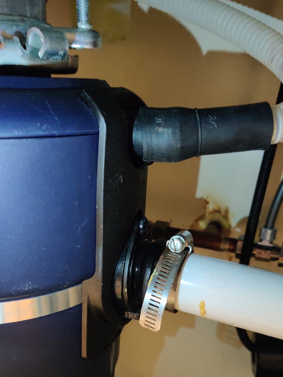 Dishwasher drain hose connection at the disposal: GE dishwasher, model GDT545PSJ6SS (dishwasher repair in Miramar, FL, July 2026)