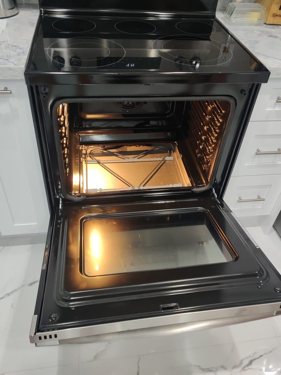 Checking the oven: GE range, model GRF600AV2SS (oven & stove repair in Port St. Lucie, FL, June 2026)
