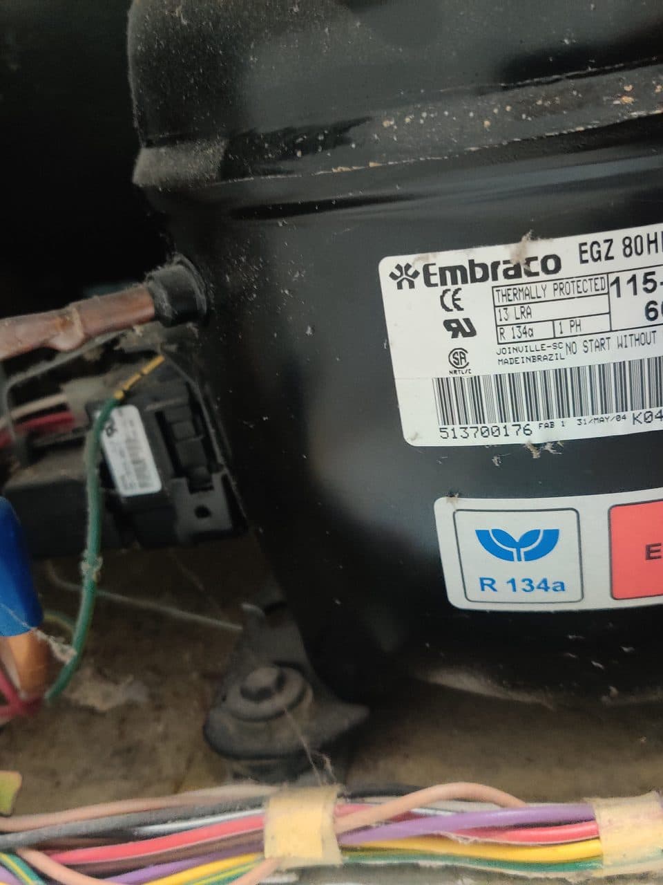 Compressor with the start relay: Whirlpool refrigerator, model GS2SHAXNB00 (refrigerator repair in Sunrise, FL, September 2026)